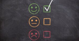 Happy faces on chalkboard