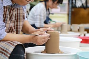 Ladies creating pottery