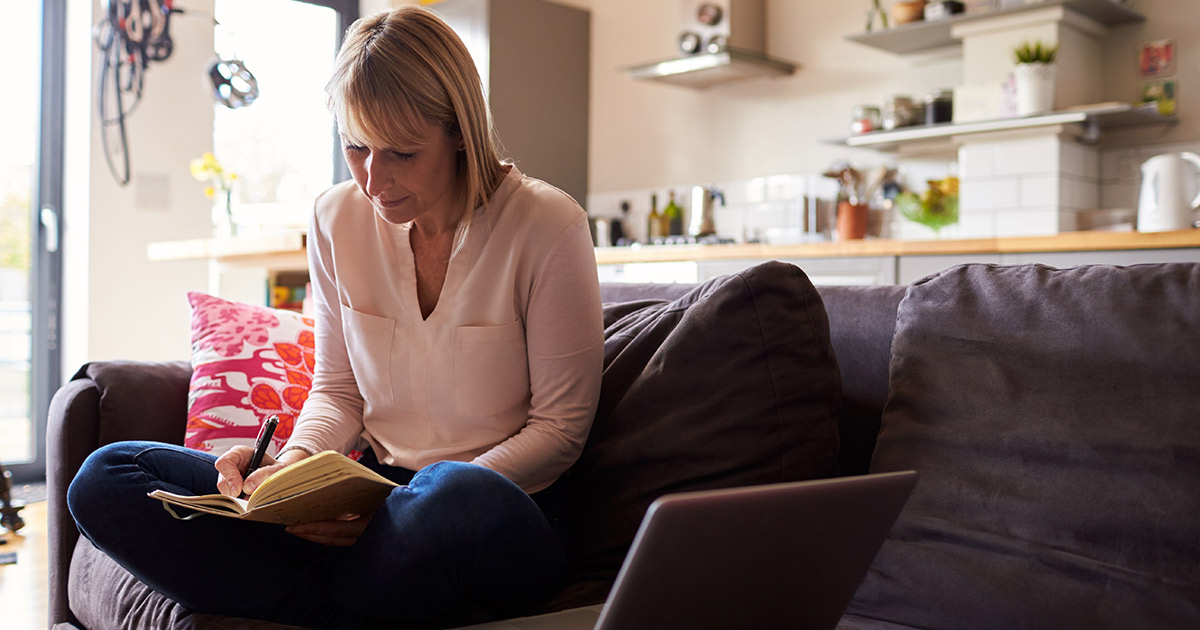 A teacher journaling about her career and personal goals