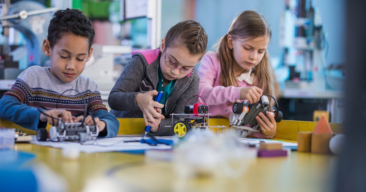 Kids playing with scientific toys