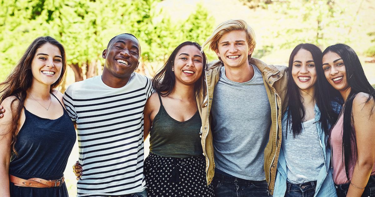 Group of students huddling outdoors