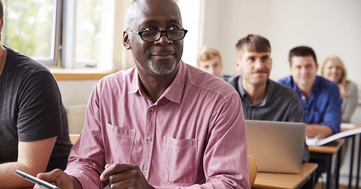 An adult learner sitting in class