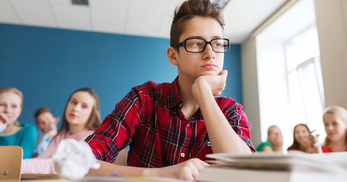 An uninspired student in a classroom