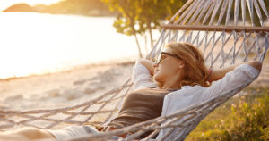 A teacher taking a nap in a hammock