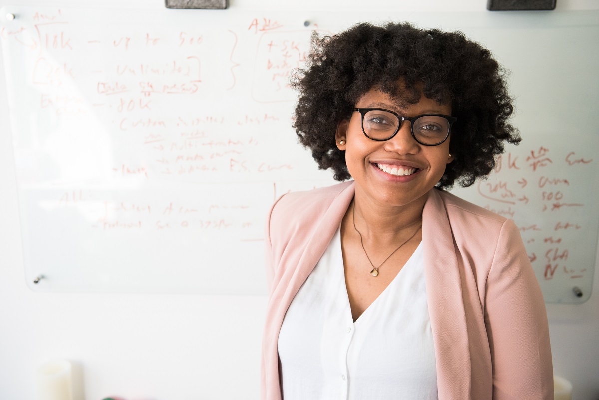 Teacher standing near whiteboard